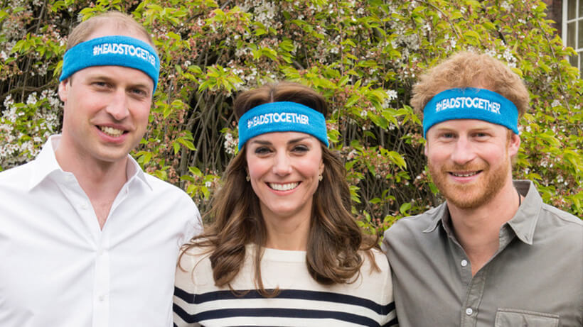 Duke of Cambridge, Duchess of Cambridge and Prince Henry of Wales standing together